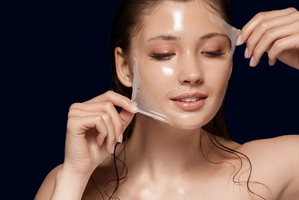 Woman peeling off a chemical peel
