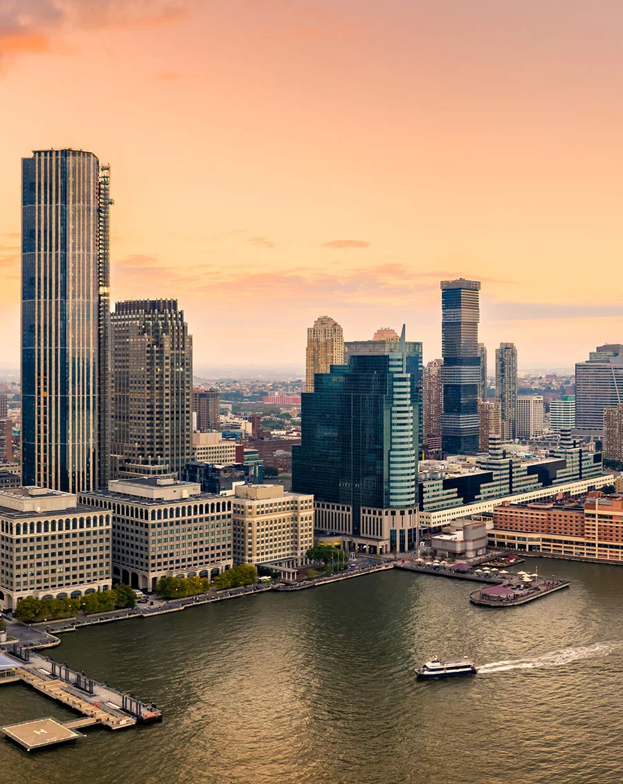skyline view of newjersey at dusk - Out of Town Patient Resources in New York and New Jersey